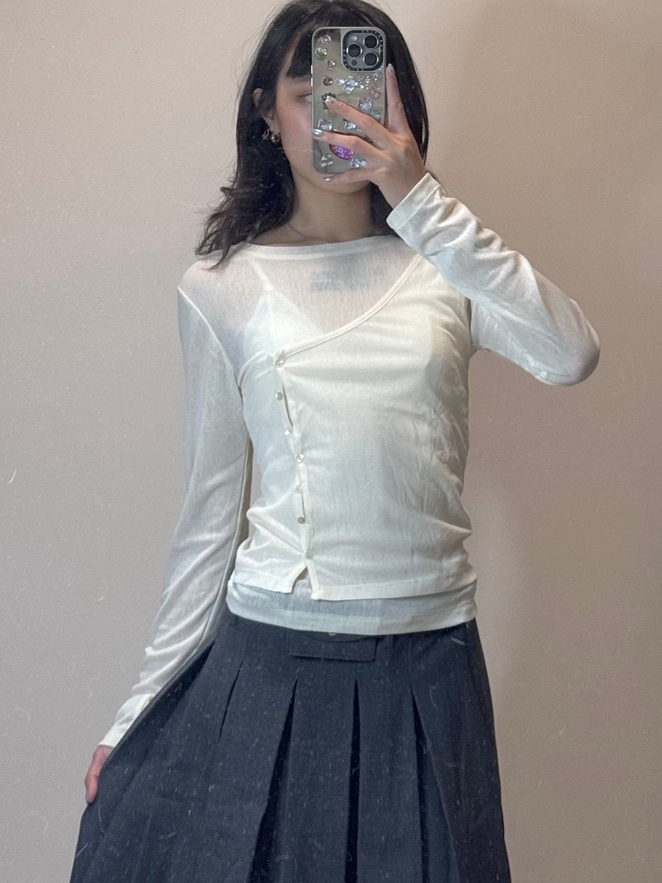 不規則斜扣透膚上衣